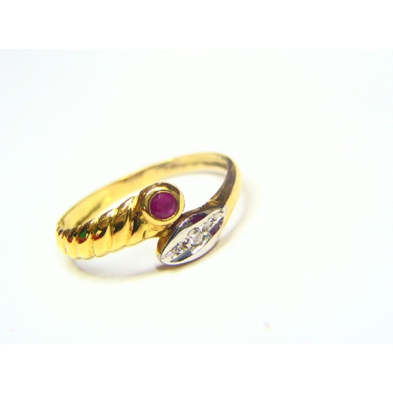 Anillo de oro bicolor con rubí y circonita 52446