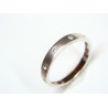 Anillo oro blanco con cinco circonitas.