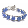 Pulsera con calcedonias azules facetadas engastadas en hilo de acero y pequeñas bolas de plata - PULZ15D
