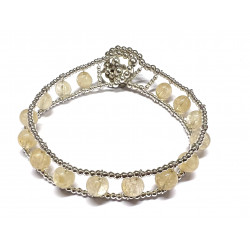 Pulsera con citrinos  engastados en hilo de acero y pequeñas cuentas de plata  - PULZ10D