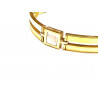 Pulsera oro semirrígida con  cinco detalles en nácar.