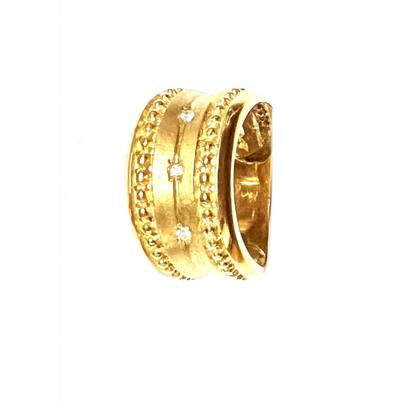 Anillo  oro  combinado mate brillo con tres circonitas