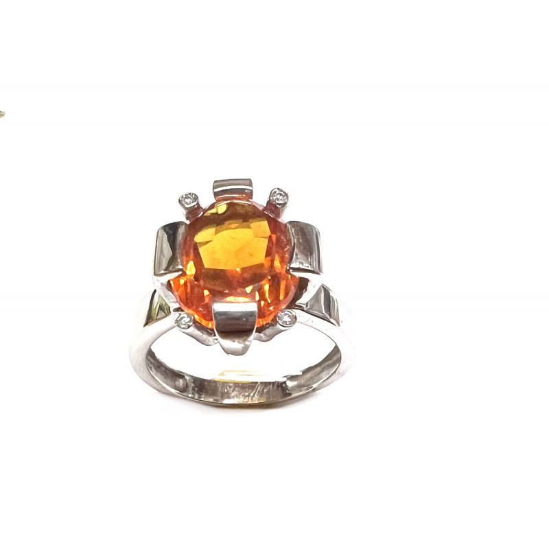 Anillo oro blanco y piedra natural de color