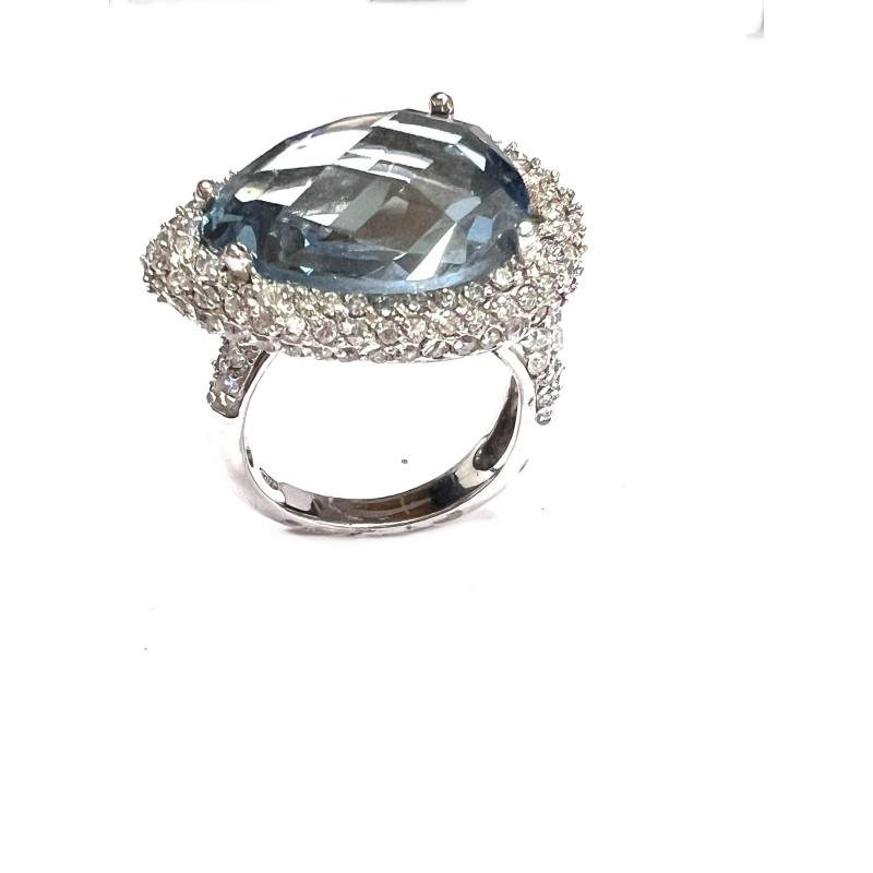 Anillo de plata con piedra azul grande y circonitas blancas R11759T