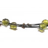 Collar corto con olivinas verdes facetadas y engastadas en hilo de acero en color negro  con grupos de pequeñas bolas do - CONV1
