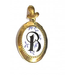 Colgante de oro y porcelana letra