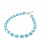 Pulsera bolas cristal en tonos azules con cierre y cadena alargadora de plata.